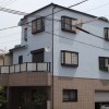 色褪せた家の外壁をローラーでムラなく塗装 大阪市旭区